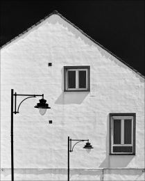 Two windows and two lanterns 