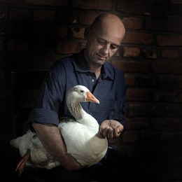  The man with a goose 