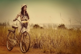 The Young Woman with Old Bicycle 