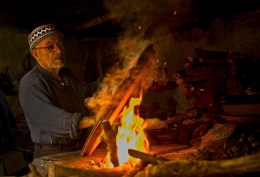 The man dominating the fire