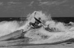 hand on the wheel catching waves. 