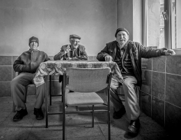 Three friends in a cafe 