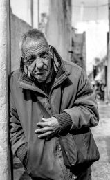 Man with bag waiting 