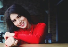 beautiful smile with a red dress 