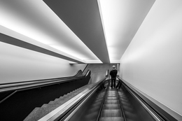 At the end of the escalator 